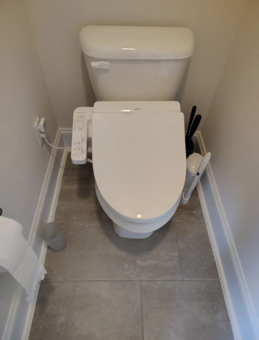 Completed toilet and bidet-seat installation