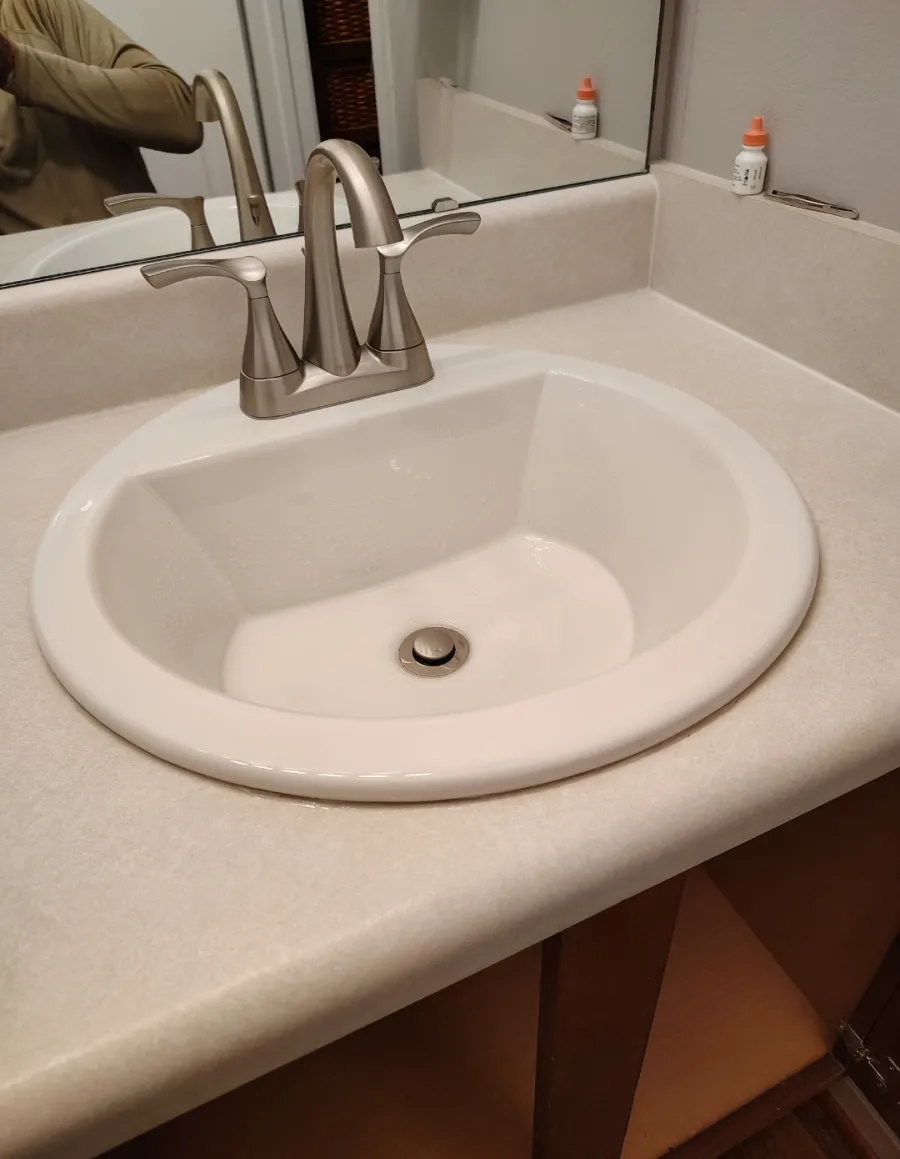 Finished bathroom sink and faucet installation